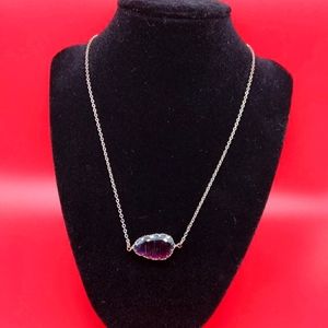 Blue pendant and silver necklace